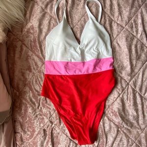 Color blocked lace up swimsuit